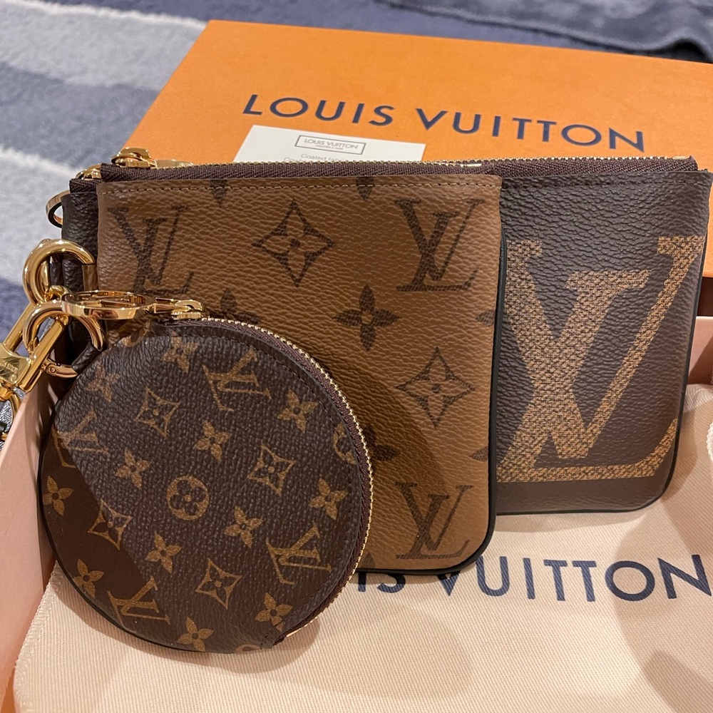 NWT Louis Vuitton Trio Pouch, M68756
